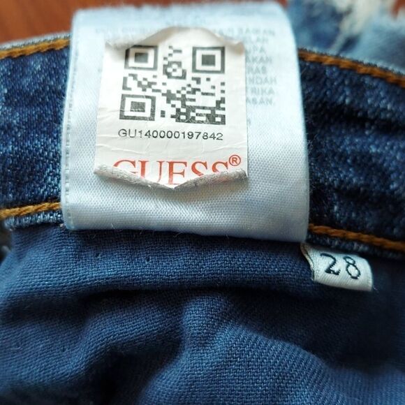 Guess High-Waisted Distressed Denim Cut Off Shorts - Picture 8 of 9